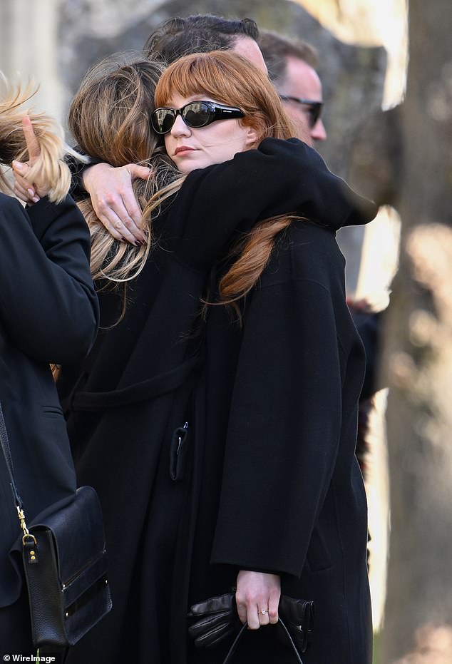 Nicola Roberts, a member of the pop group Girl's Aloud, was among the first mourners to arrive.