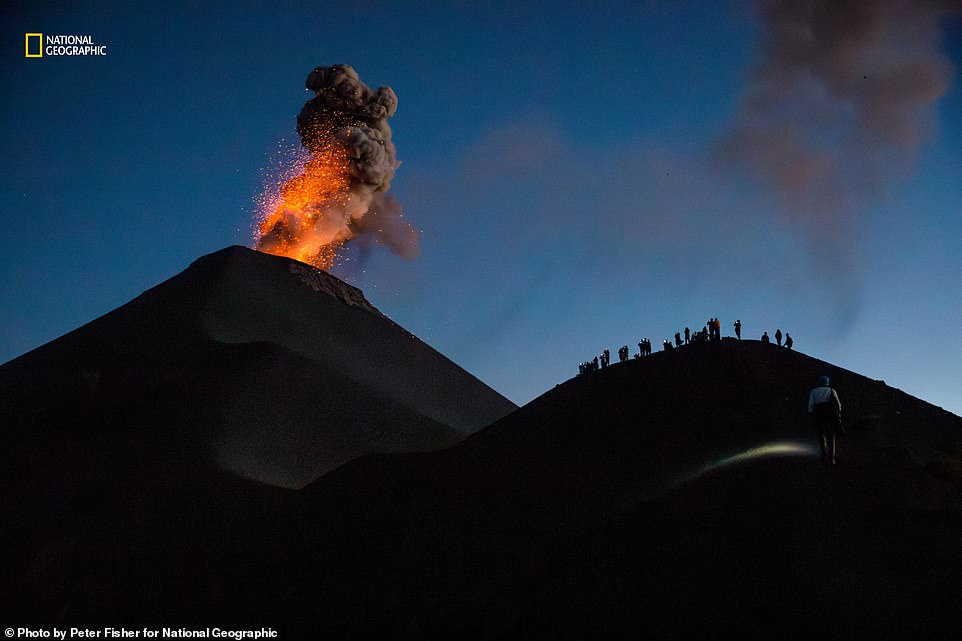 A fascinating photo of Guatemala's Fuego volcano, which has been erupting continuously since 2002. Nat Geo reveals: 'A day hike up its dormant twin, Acatenango, and through a valley rewards adventurers with a view from the Fire Crest Rashes may occur several times a day'