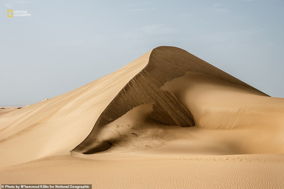 This is the Siwa Oasis in the Western Desert of Egypt. Its dunes are a great attraction for tourists, says Nat Geo