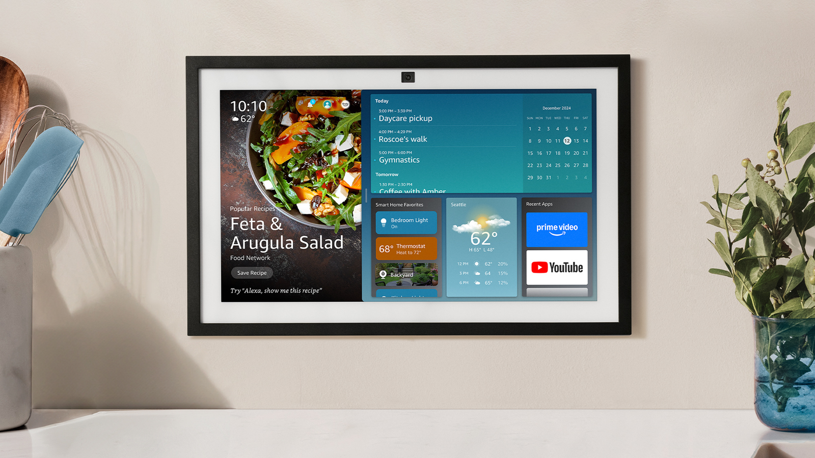 Echo Show, a wall-mounted smart digital device with a screen that shows weather news and app thumbnails.