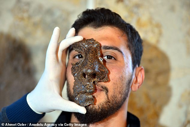 An iron face mask (pictured) believed to have been worn by an experienced member of the Roman cavalry some 1,800 years ago has been unearthed in north-central Turkey. The team found this relic in 2021