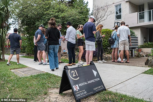 The expat says staying in Bali for two weeks will be cheaper than staying in a hostel in Sydney (pictured, Sydney renters queue to inspect a property in February)