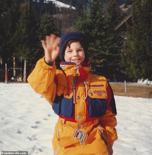 Carlo is depicted as a young boy waving at the camera while enjoying a holiday in the snow