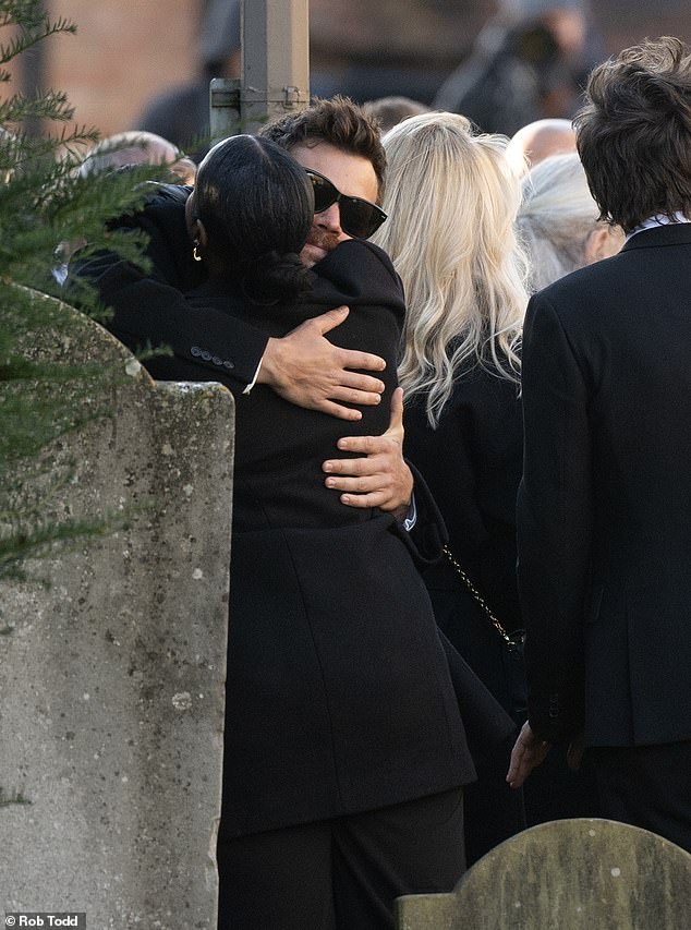 A hug from Harry Stiles as he leaves Liam Payne's funeral on November 20