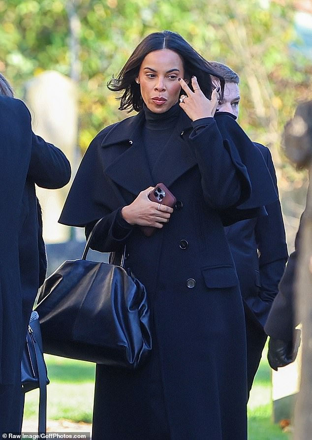 Rochelle Humes was accompanied at the funeral service by her husband Marvin