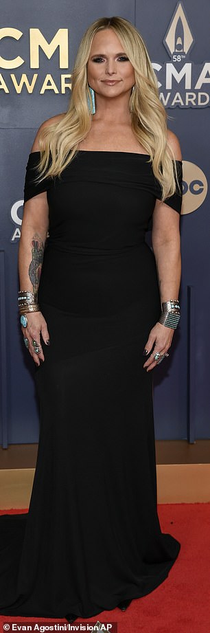 Miranda's red carpet look featured turquoise jewelry accents that included block-shaped earrings, cuffs around her wrists, and statement, chunky rings.