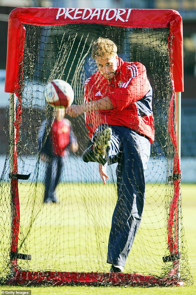 William kicks a rugby ball during his training session with the British and Irish Lions in 2005.