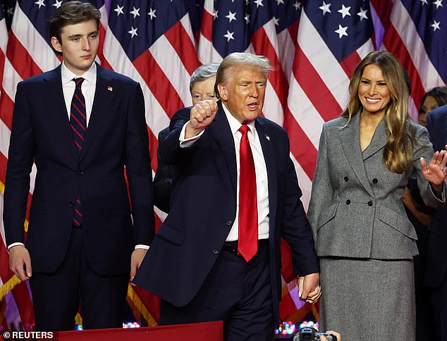 Barron, 18, could be seen towering above the rest of the Republican cohort as they took the stage at Trump's Mar-a-Lago estate.