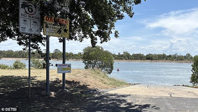 New warning signs have been installed at the site of the crocodile sighting in the Burnett River.