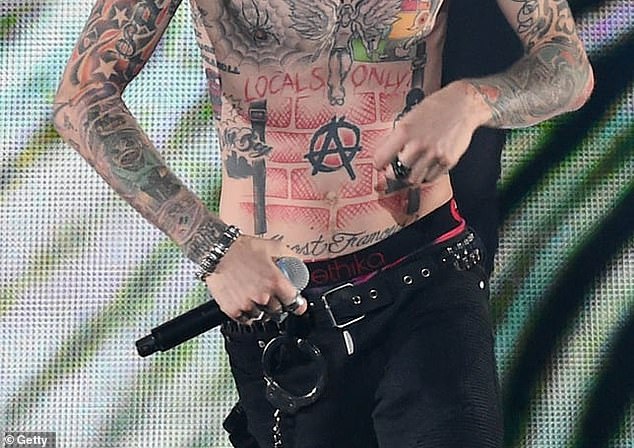 10 Machine Gun Kelly tattoos decoded as the musician debuts
