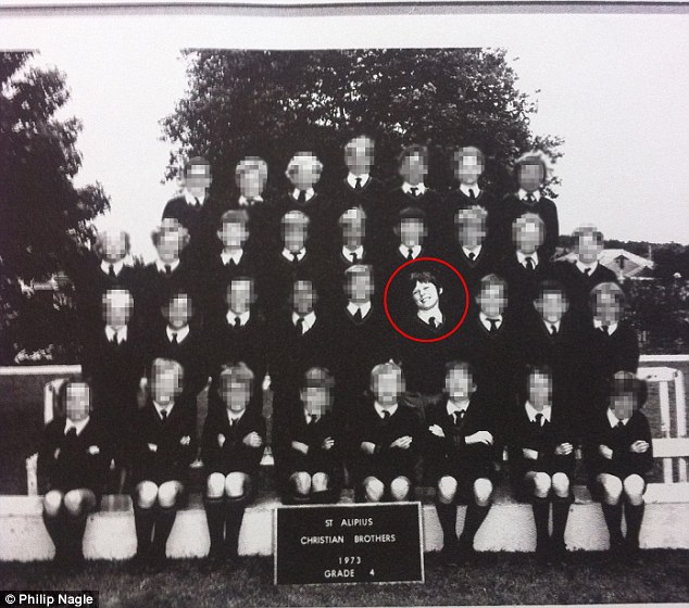 Philip Nagle (circled) claims that 12 of the 33 students in the photograph committed suicide due to sexual abuse that took place at the school.