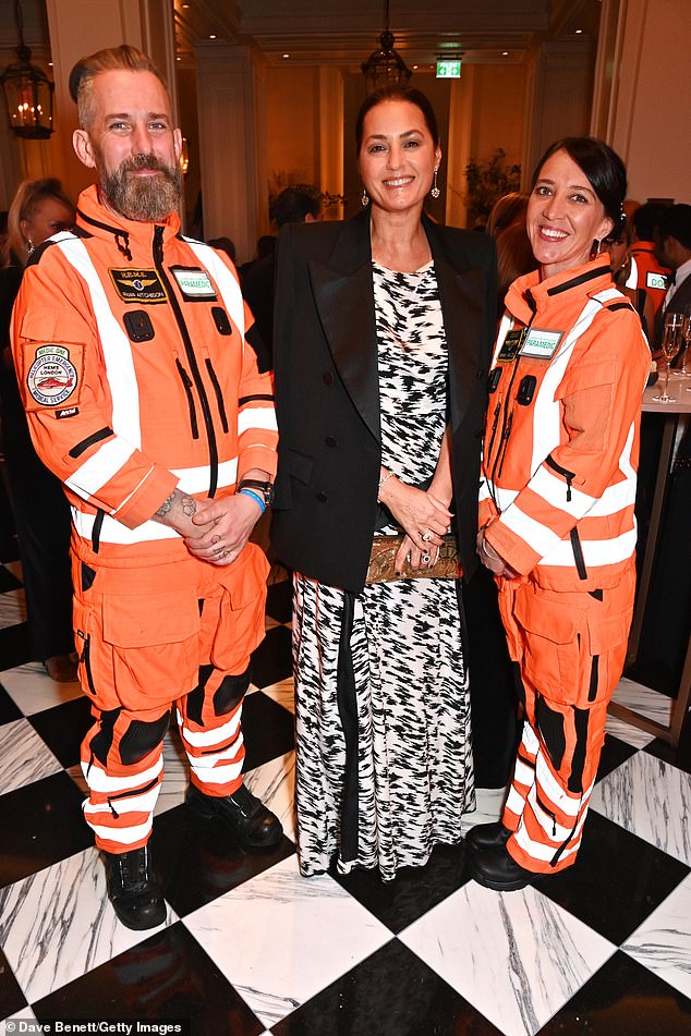 Yasmin Le Bon posed with London Air Ambulance paramedics Ross Aitchison (left) and Tamara Van-Zyl (right)