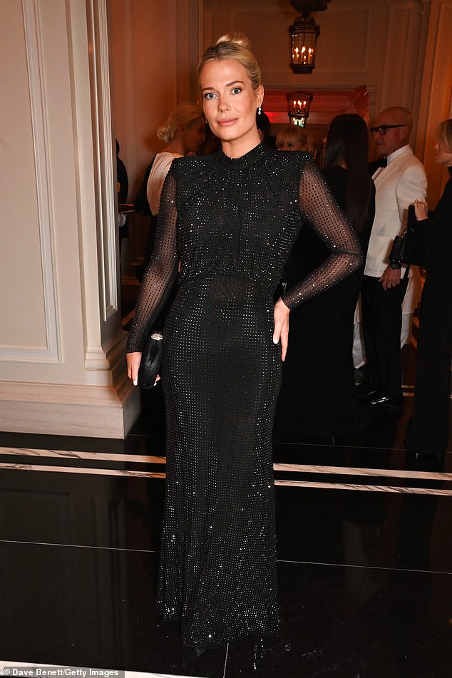 Lady Amelia Spencer turned heads in a floor-length black dress adorned with gems.