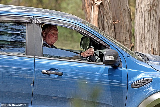 Mr Murphy (pictured, appeared visibly dazed and was turned away by police officers after visiting the bush area at Woowookarung Regional Park on Wednesday).