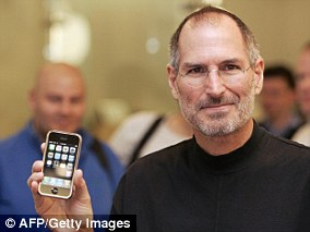 Then-Apple CEO Steve Jobs with the iPhone