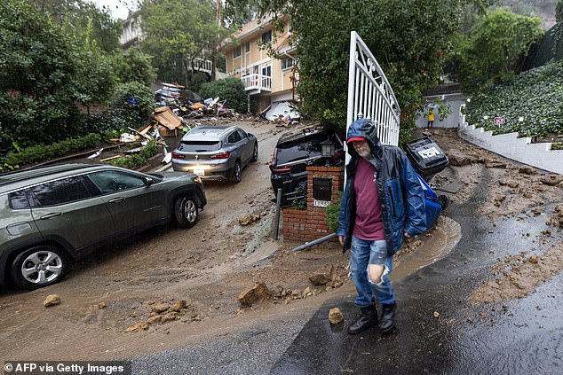The atmospheric river, a weather pattern formed by plumes of moisture that can produce torrential amounts of rain, has killed at least nine people, leveled dozens of homes and caused a massive sewage spill in Los Angeles County.