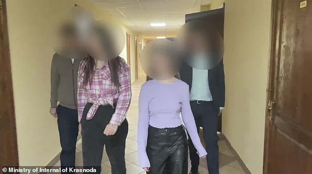 The police take Vlada and Vika away. The police told the two that they could 