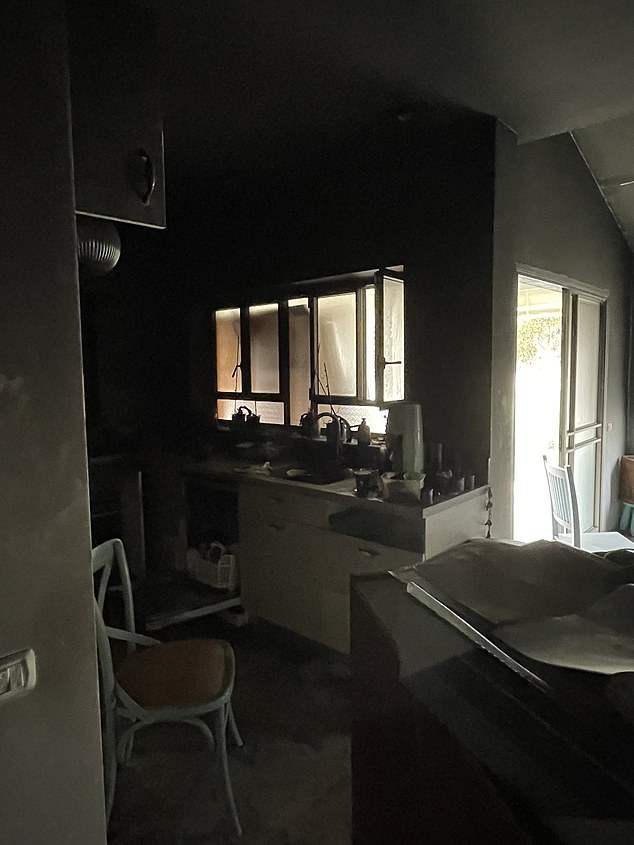 The kitchen inside one of the houses at Kibbutz Be'eri is seen on Wednesday. Hamas gunmen are documented attacking homes first while residents took shelter inside.