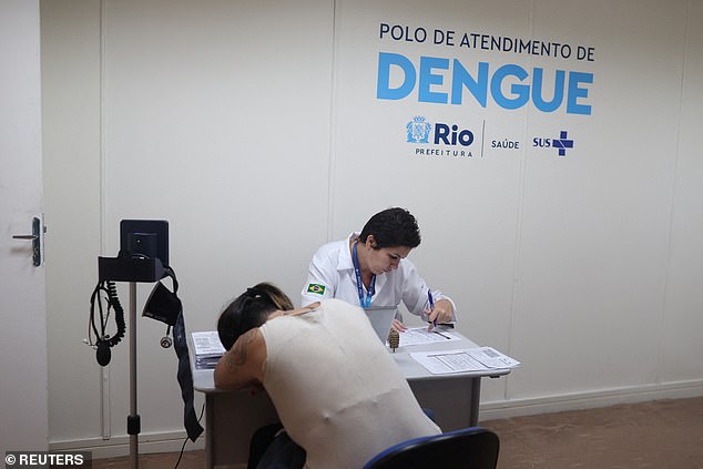 A doctor treats a patient at the dengue emergency medical care unit in Rio de Janeiro, Brazil, on February 6.