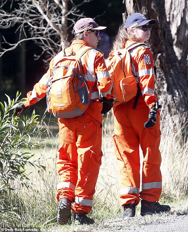 Women joining the search (pictured) for Ms Murphy have been urged to travel in pairs through the woods, never alone.