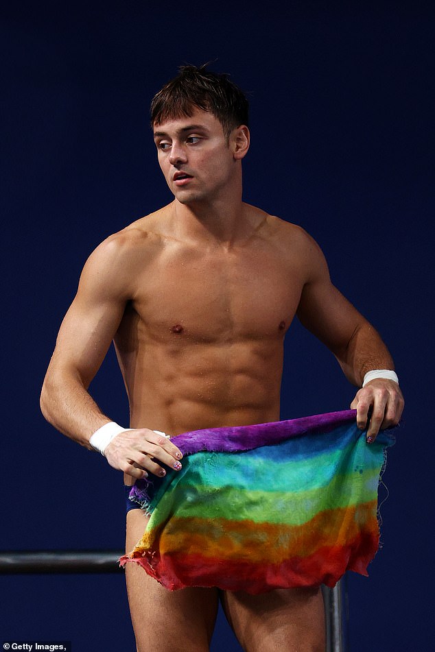 The 29-year-old wears a Pride towel to support LGBT+ rights during the event in Qatar