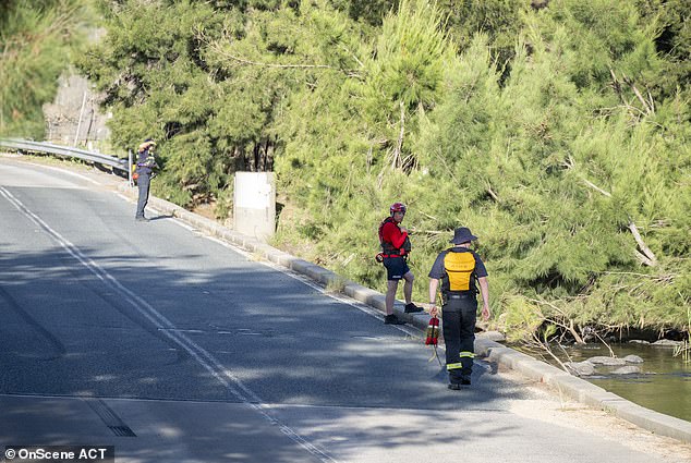 Searchers are looking for any sign of the swimmer from the bridge outside Canberra.