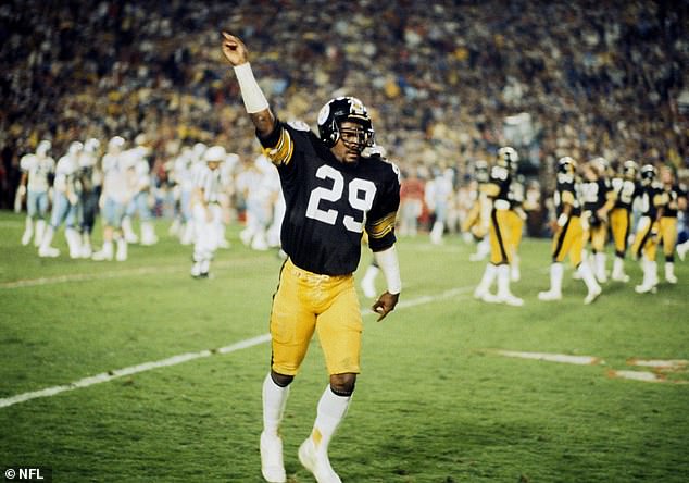 Steelers cornerback Ron Johnson raises a finger after beating the Cowboys in Super Bowl XIII