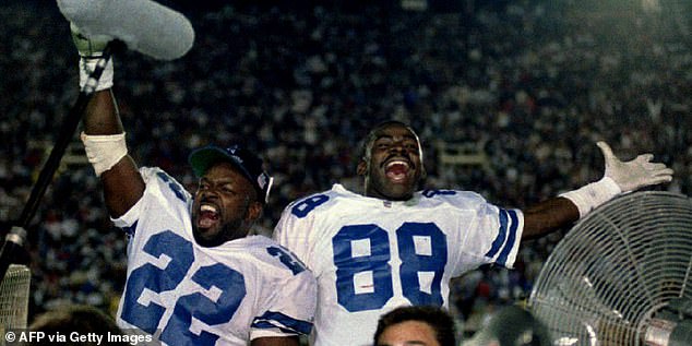 Cowboys stars Emmit Smith (left) and Michael Irvin (right) celebrate victory in Super Bowl XXVII.