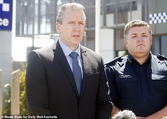 Acting Detective Superintendent Mark Hatt (left) addressed a media group outside Ballarat West Police Station on Friday.