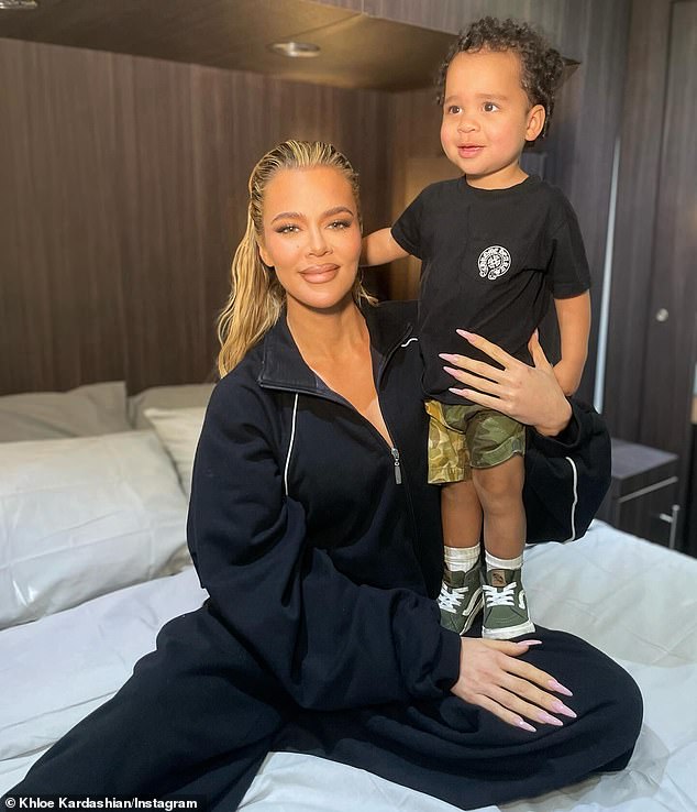 In the photos, the 39-year-old reality TV personality flashed a wide smile while spending time with her youngest son, two, while relaxing in bed, adding a short message that read: 