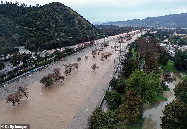 California is being hit by a deadly weather system that has released more than 11 inches of rain in some areas like Los Angeles (pictured).