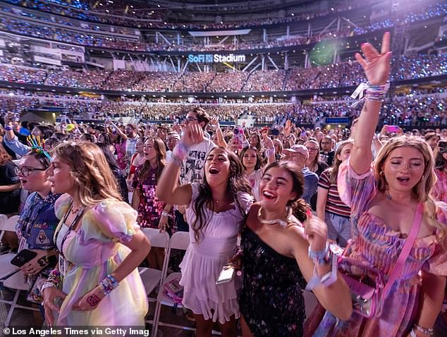 Some Australian fans were left devastated as their tickets disappeared amid a rise in scams and account hacking (pictured: Fans at the Eras tour in Los Angeles).