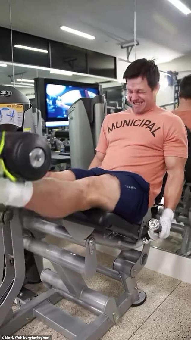 Mark made sure fans knew he doesn't skip leg day as he performed all sorts of exercises including leg presses, barbell split squats, leg extensions (pictured), deadlifts and wall squats.