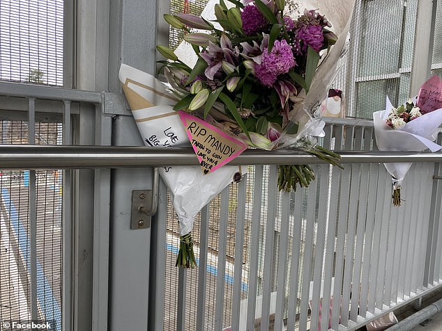 Mandy's relatives have paid tribute at the train station with bouquets of flowers, candles and notes