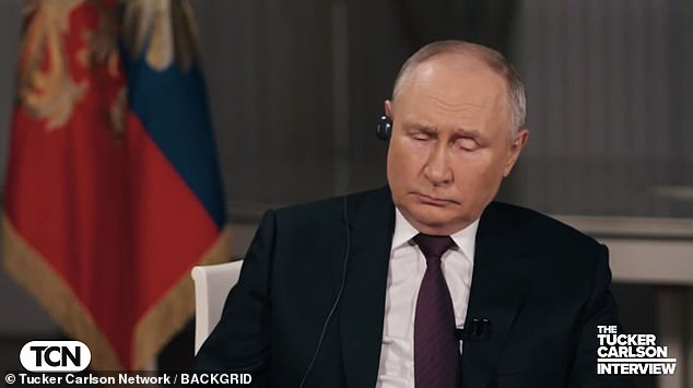 The Russian president, 71, also coughed and cleared his throat several times while making explosive claims during the talk.