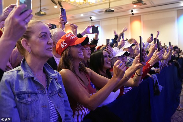Supporters of former President Donald Trump attend a late-night victory party at the Nevada caucus in Las Vegas.