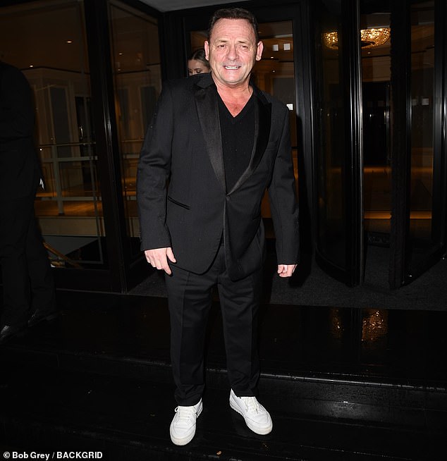 Also there was Emma's on-screen husband, Perry Fenwick, 61, who paired a black suit with white sneakers.