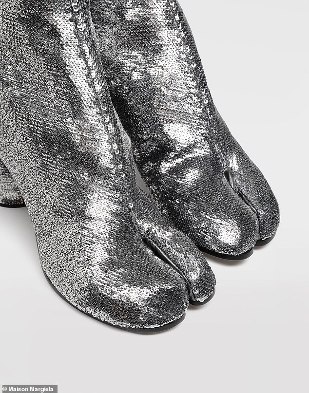 Tabi shoes originate from Japan and feature a split front to promote stability and flexibility.  Pictured above are Maison Margiela's silver sequined Tabi boots, which retail for £990.