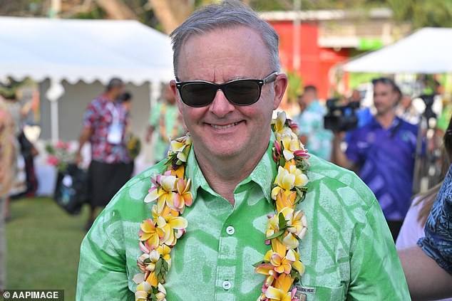 If Albanese was worried about his declining popularity at home, the smile on his face didn't give it away.