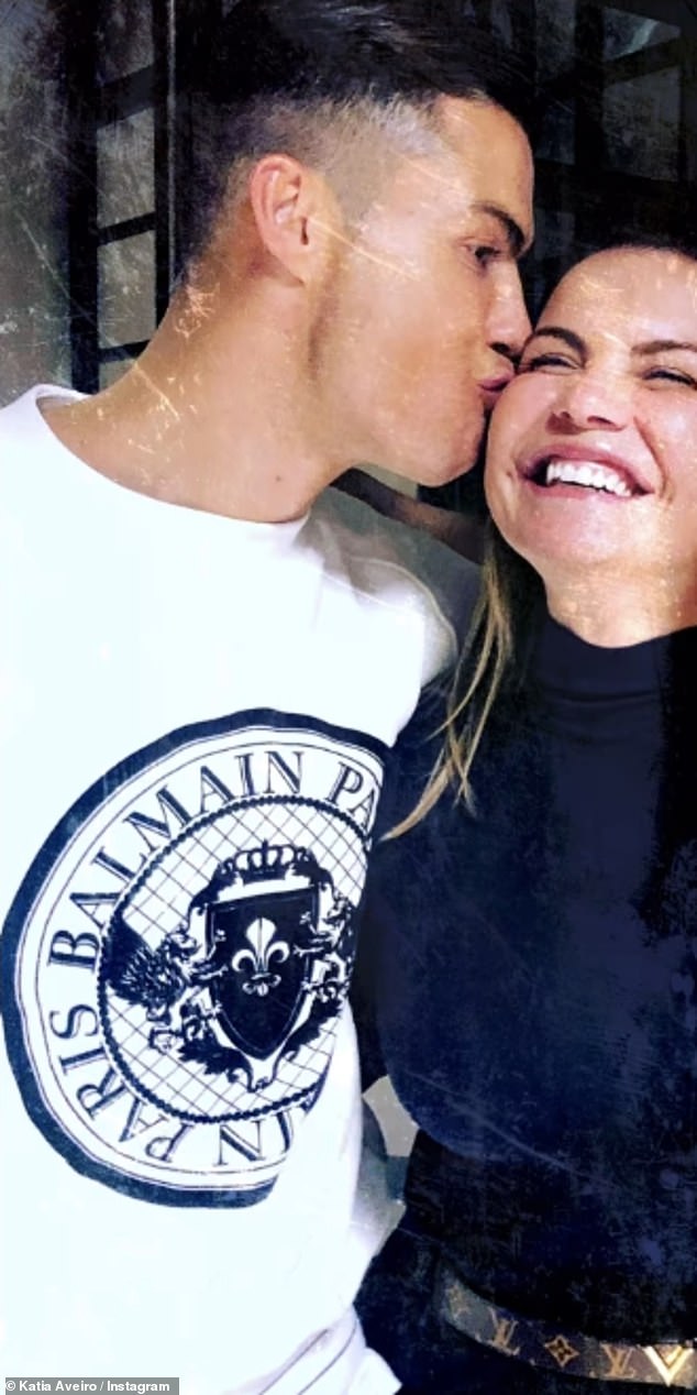 In other adorable snaps, Ronaldo can be seen kissing his sister on the cheek and she smiled.