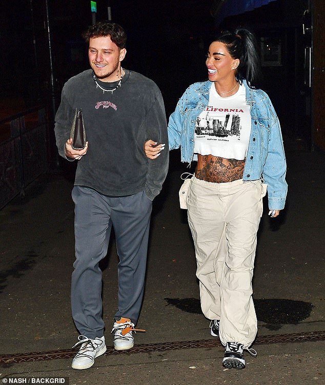 JJ, 31, couldn't stop smiling as she strutted alongside the showbiz veteran, following the shocking news that her former co-star Ella Morgan slammed Katie for 