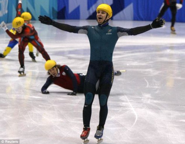 Sliding to the finish line: Steve Bradbury celebrates his unexpected victory in the 2002 Winter Olympics final