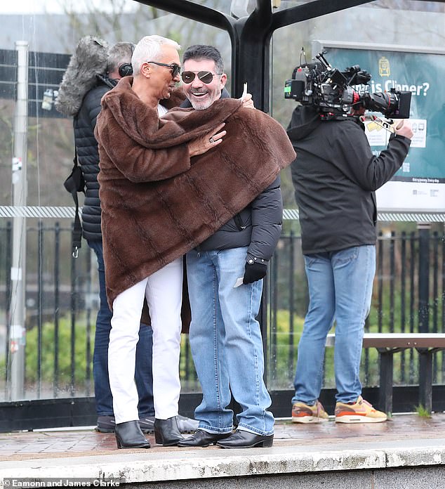 The couple were hysterical as Bruno hugged Simon.