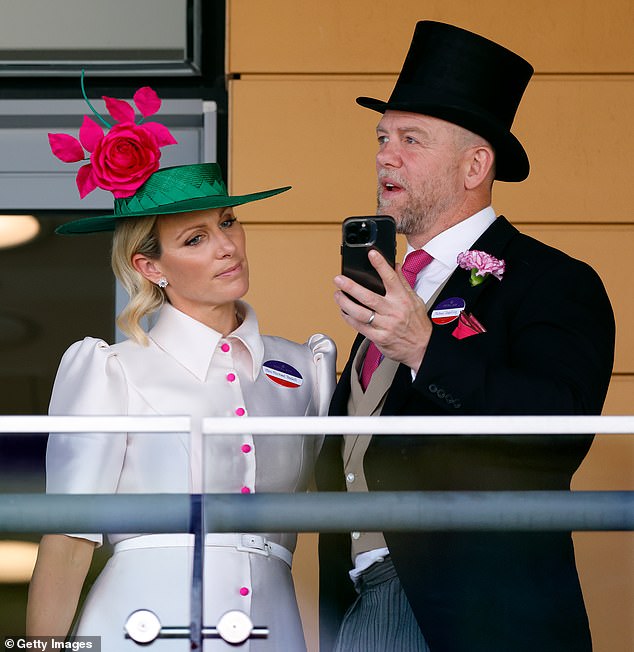 Zara and Mike, pictured at Ascot last year, save pet names on their phones