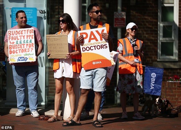BMA junior doctors and Unite the Union health workers strike at Christie NHS Foundation Trust in Manchester on June 14.