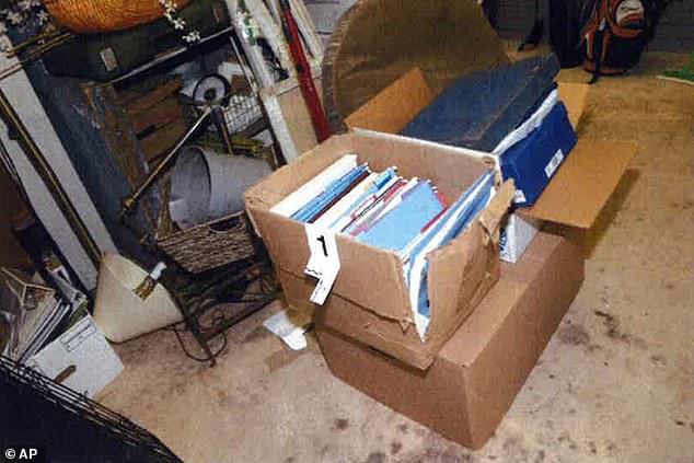 An image from Biden's classified documents report showing a damaged box where classified documents were found in President Biden's garage in 2022.