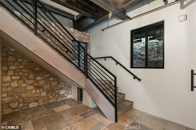 These stairs lead to the huge second floor living room.