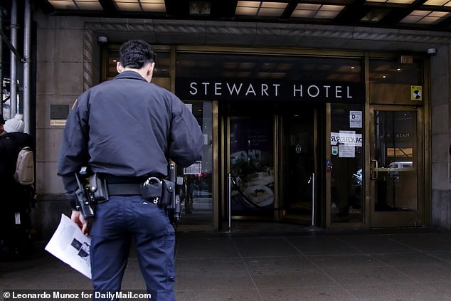 Police were seen outside the Stewart Hotel on Friday as they searched for the alleged gunman, believed to be a migrant between the ages of 15 and 20.