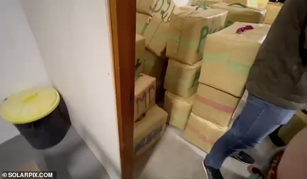 A warehouse full of packages containing cannabis. Name 
