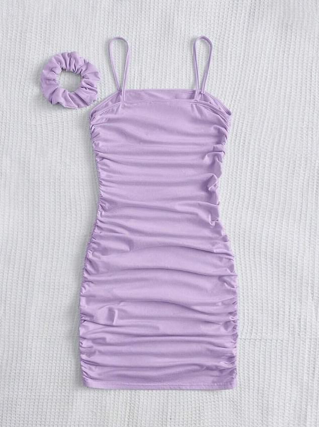 Girls aged four to seven can opt for this lilac ruched mini dress which costs £4.99